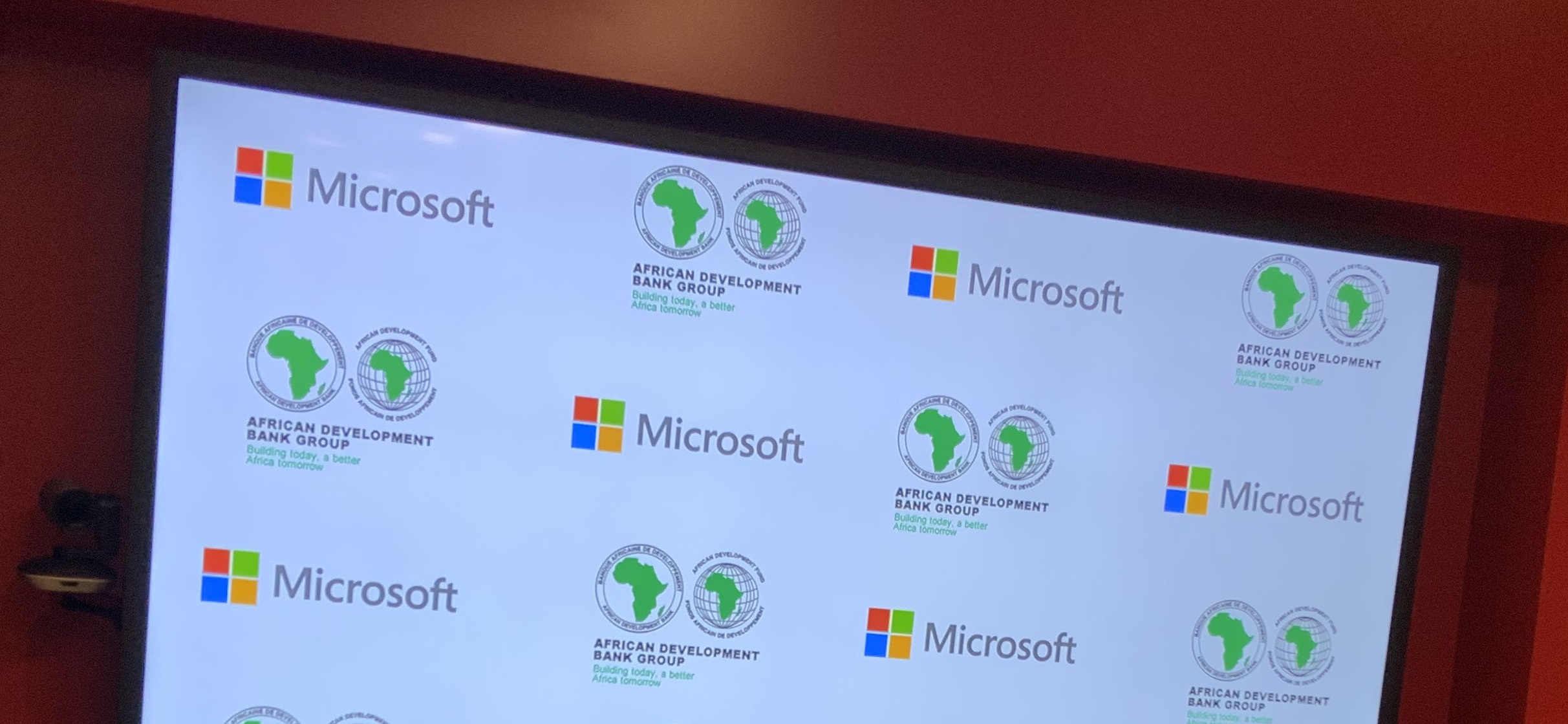 Microsoft and Africa Development Bank logos on a screen